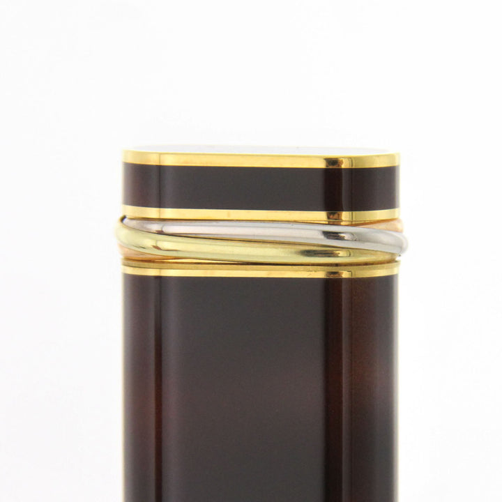 Accendino Cartier Trinity Lacca marrone — Rif. 17956N Francia, anni '80